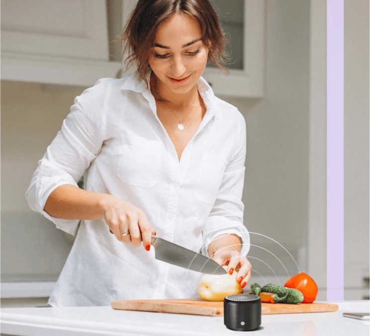 lady enjoys Nano Boom in kitchen